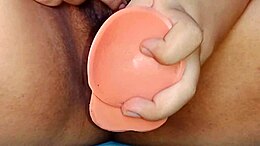 Chubby amateur achieves orgasm with dildo