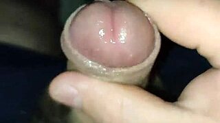 Bearded gay strokes his cock in bed