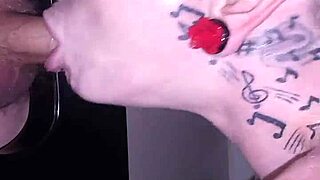Bald and tattooed gloryhole slut takes a facial