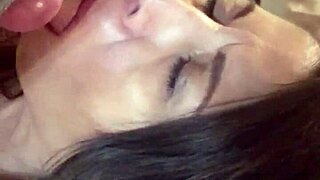 Latina milf on her knees sucks off a big dick and gets a facial