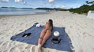 At Floripa beach, I revealed my petite bosom, leading to a throbbing arousal and an enjoyable oral pleasure session.