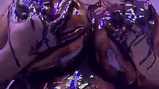 Ebony women with chocolate-colored skin and alluring breasts