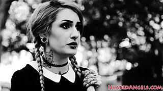 Tattooed beauty rides and gags in alt porn video