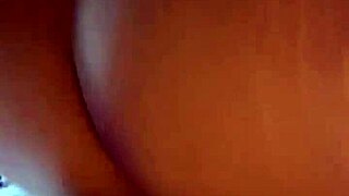 Redhead's sensual back view with a big black cock