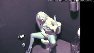 Blonde Babe Fingers Pussy in Public Bathroom