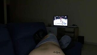 Aroused Latina watches UFC and pleasures herself