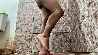 This video features an amateur porno star with a big cock in the bathroom