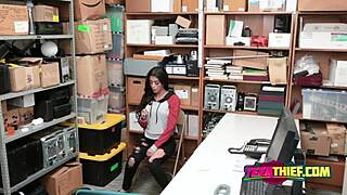 A storyline-driven porn movie featuring a desk and a guard
