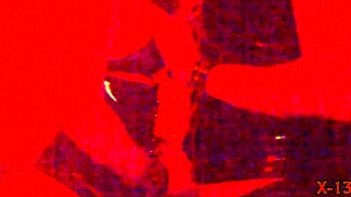 Blackray's seductive latex outfit enhances his alluring piercings in a passionate encounter