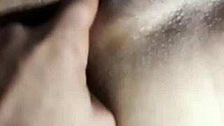 Cam girl rubs her pussy on camera