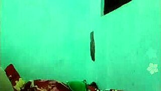 Solo Asian girl indulging in self-pleasure on camera