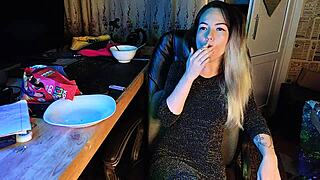 Lovely dominatrix indulges in a cigarette