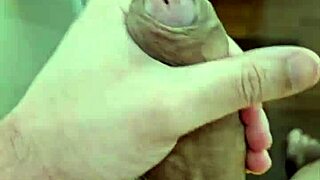Amateur hunk gives a handjob with impressive size