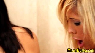 Lesbian shower with fetish play and anal toys