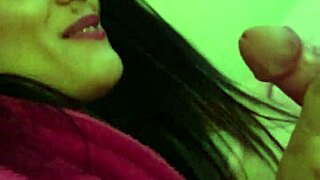 Amateur with glasses gives a naughty blowjob