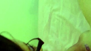 Amateur with glasses gives a naughty blowjob
