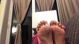 Mistress Marikah Bentley dominates her slave with foot worship and BDSM