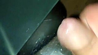 A bearded man ejaculates before washing his face