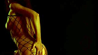 A young and beautiful woman of European descent, with a Russian background, indulges in solo play, showcasing her skills in the art of fingering.
