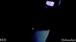 A woman gives a stranger a blowjob at a glory hole