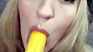 Solo blonde enjoys masturbation with a banana