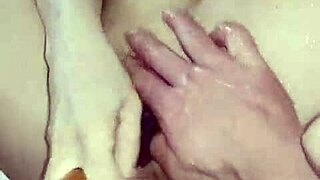 Amateur MILF enjoys squirting orgasm with big toy