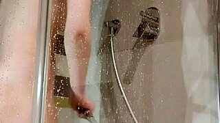 A slutty teen masturbates her tight asshole in the shower