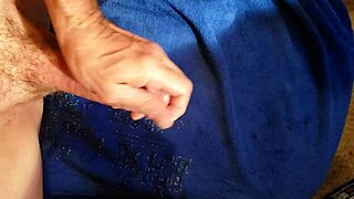 Solitary male pleasuring his large penis until ejaculation