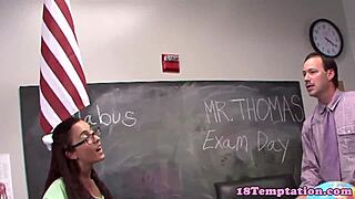Young red-haired amateur gives blow job to her teacher in class.