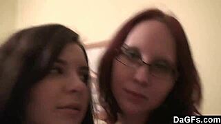 Two red-haired teens have fun with a camera in the bedroom