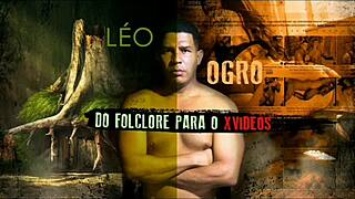 Kelly, the seductive sit-down showgirl, interviews Leo Ogro on the Spartan Channel on Xvideos.