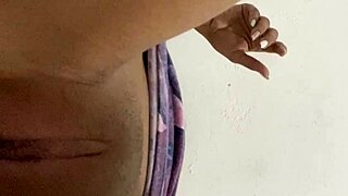 An innocent 18-year-old girl enjoys playing with her tender and smooth vagina