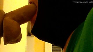 Gay man in hoodie enjoys deep throat penetration with a dildo