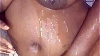 Black beauty enjoys a sensual shower experience