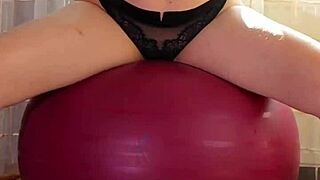 Model in shape gets off while she is working out outdoors