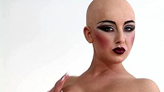 Luca Bella in a hot latex corset, shaved bald head and wearing pantyhose