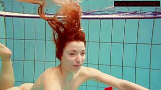 Hot ginger Polish girl swims in the pool and gets naughty under the water