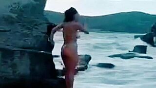 Gabriela Sari in a solo performance wearing only a tanga