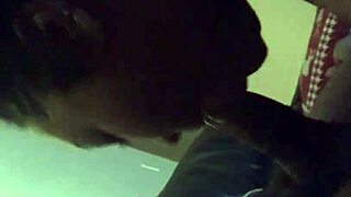 Beautiful black girl gives a very hot blowjob to a man with a big dick
