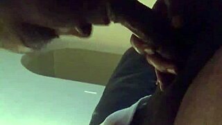 Beautiful black girl gives a very hot blowjob to a man with a big dick