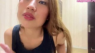 Asian mistress dominates her smoking foot slave in this homemade video