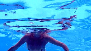 Sexy Milf Emily Ross Teases with Underwater Bikini Reveal