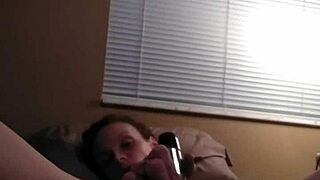 Solo session of a red-haired woman with sex toys