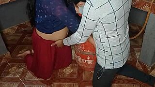 Indian bhabhi’s big ass bent over for a kitchen doggystyle pounding.