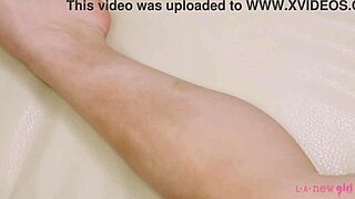 Beautiful brunette undressing for a sensual massage