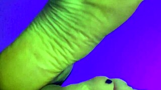 Barefoot boss in latex leggings dominates in the office