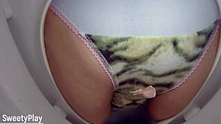 Housewife's wet panties on toilet bowl cam