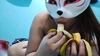 Beautiful Asian woman enjoys playing with food and has great body shape