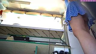 Young European beauty flashes her panties at work in homemade video