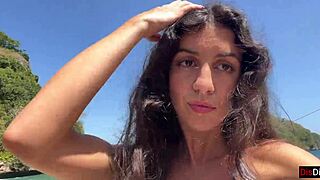 Brunette gets a messy facial on the beach
